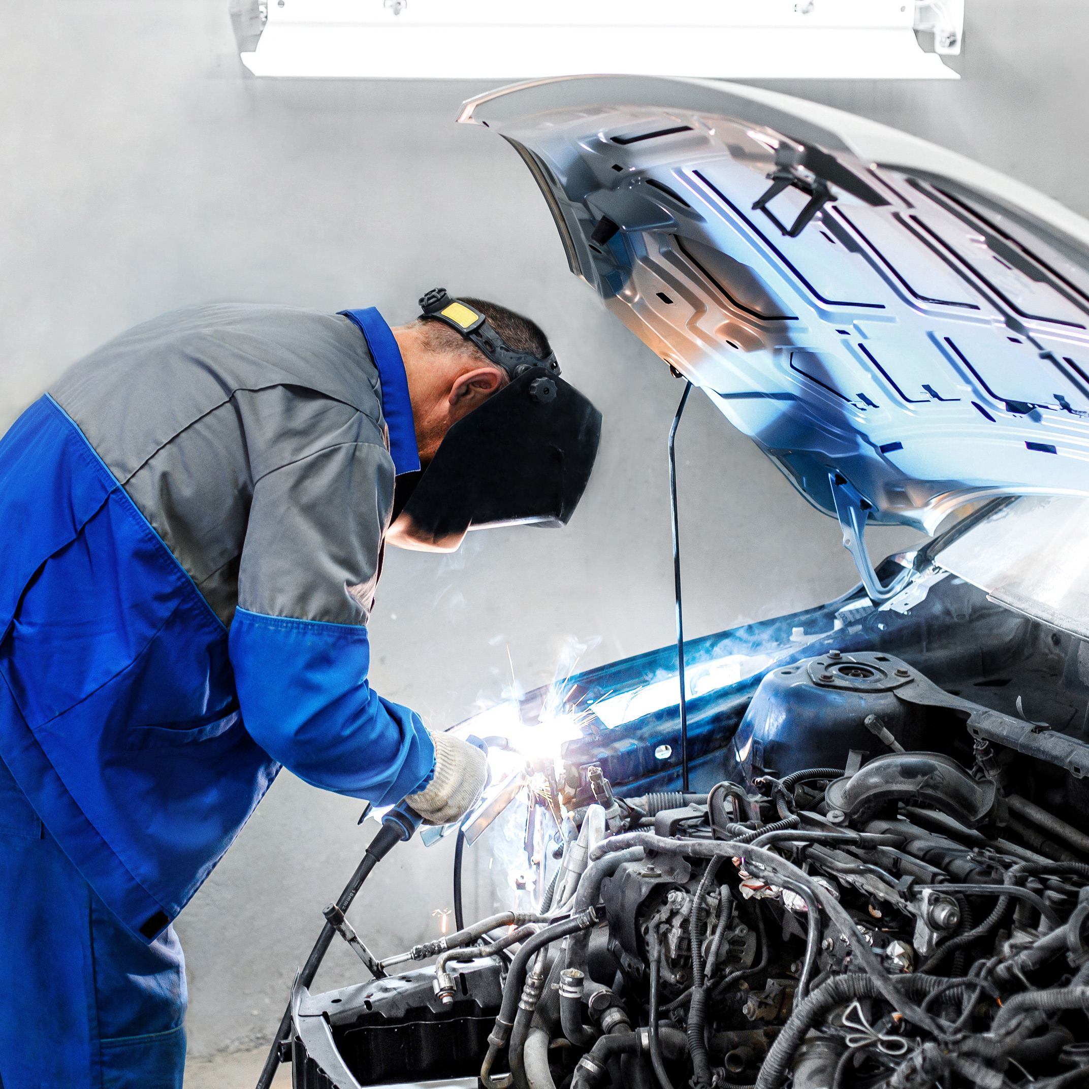 Mechanic repairing a vehicle - Car Repairs Greenwich