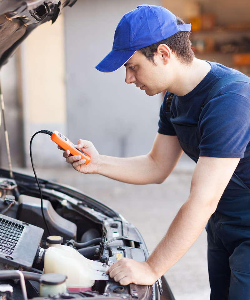 Mechanic diagnosing a vehicle - Car Diagnostics Greenwich